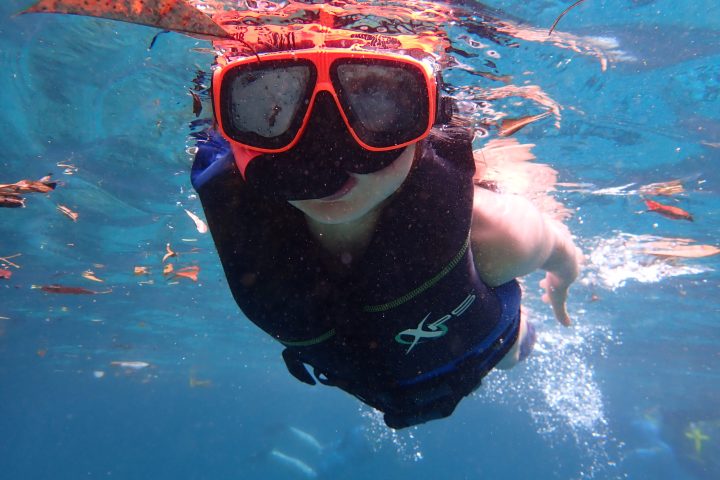 Child swimming in Three Sister Springs in Crystal River, Florida with Paddles Outdoor Rentals
