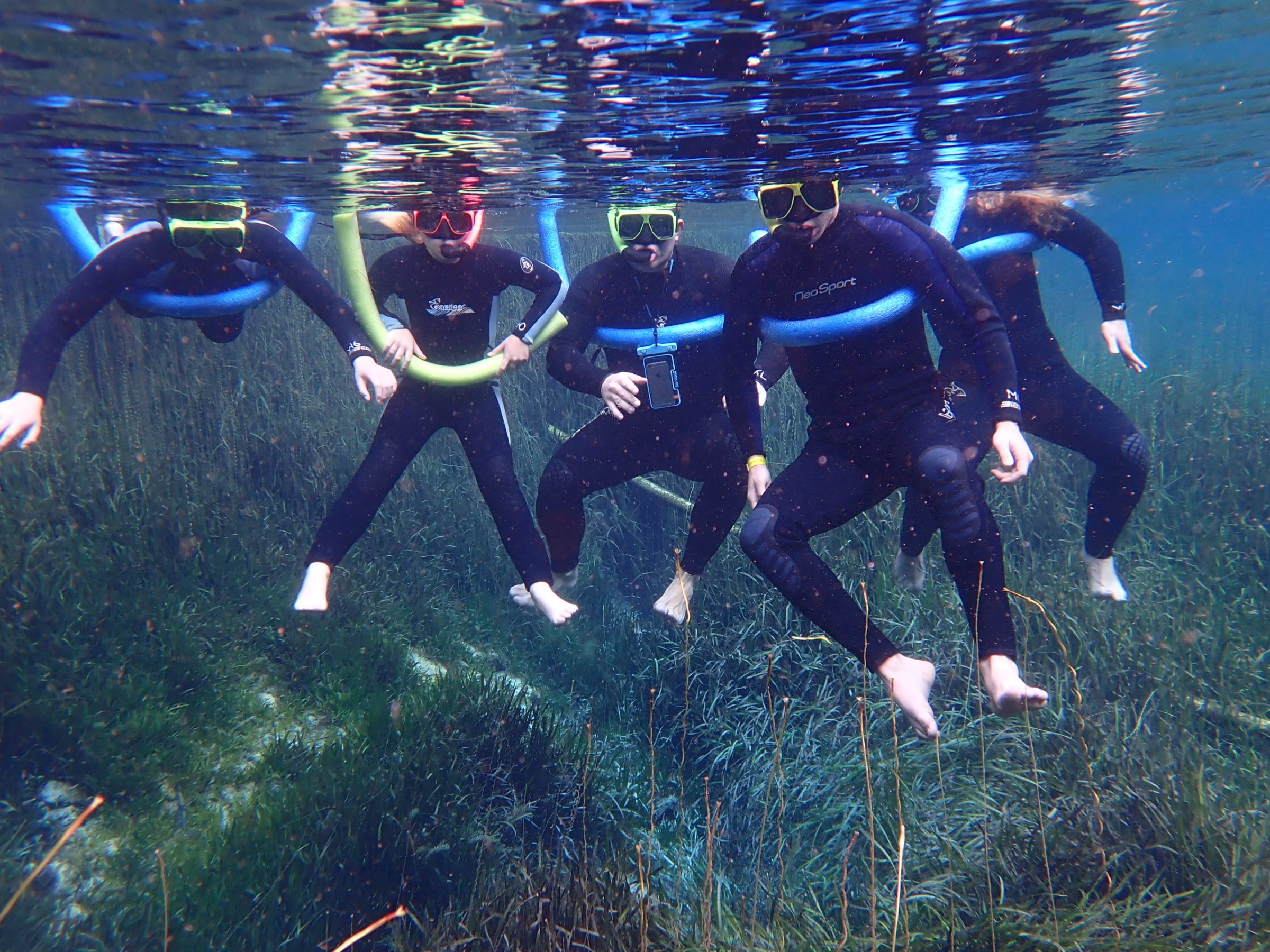 Hanging out in the springs in Crystal River, Florida at Paddles Outdoor Rentals