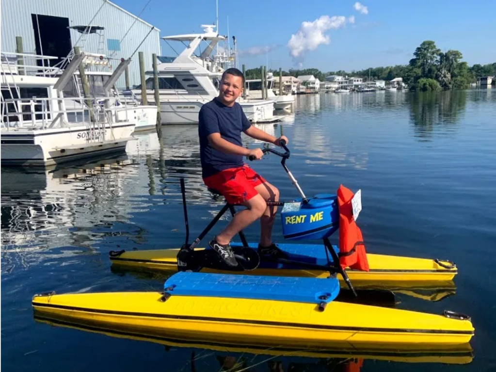 a man in a boat on a body of water